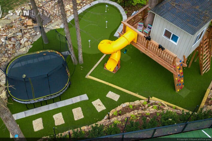 SYNLawn El Paso Texas residential backyard treehouse trampoline